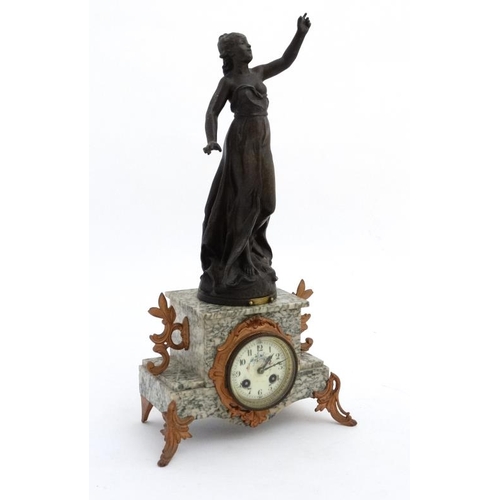 84 - French marble clock : a green flecked marble cased 8 day clock surmounted by a sculpture  after Vict... 