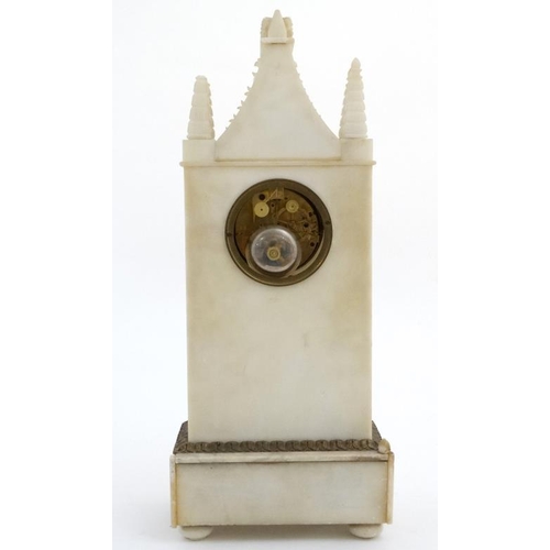 85 - French Alabaster Cathedral Clock : An 8 day Silk Suspension mantle clock striking on a bell with out... 