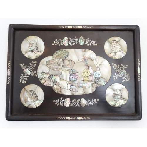 857 - A Chinese native hardwood tray with inset mother of pearl with penwork decoration. 14 1/2'' x 10 1/3... 