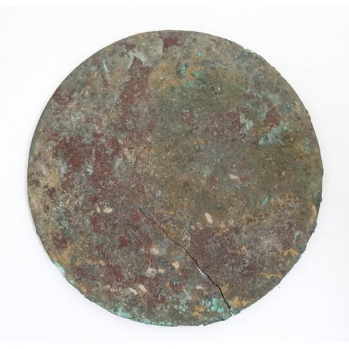 859 - Oriental:  Chinese Bronze Mirror : a disc shaped mirror ( now with signs of verdigris ) having relie... 