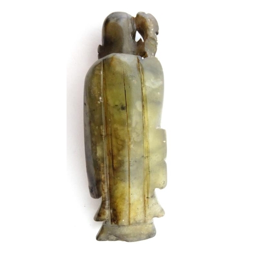 865 - A 19thC black and grey jade figure of Shou ( the god of longevity) 3 5/8'' high