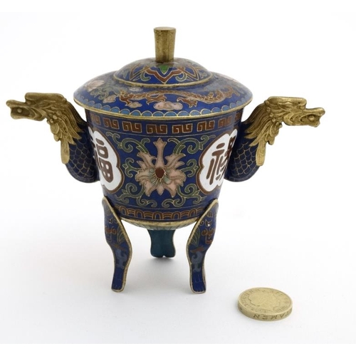 869 - A Chinese Cloisonne gilt lidded three footed vessel with dragon head handles 4 1/4'' high