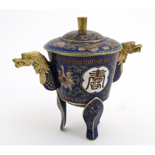 869 - A Chinese Cloisonne gilt lidded three footed vessel with dragon head handles 4 1/4'' high