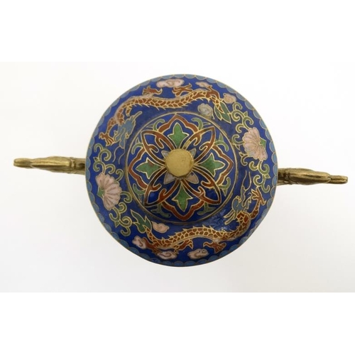 869 - A Chinese Cloisonne gilt lidded three footed vessel with dragon head handles 4 1/4'' high