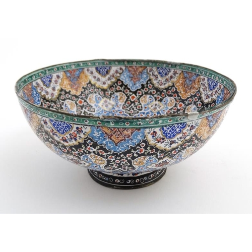 876 - A 20thC Persian enamelled pedestal bowl and matching plate. The plate 9 3/4'' diameter