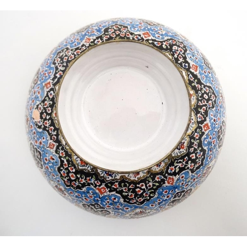 876 - A 20thC Persian enamelled pedestal bowl and matching plate. The plate 9 3/4'' diameter