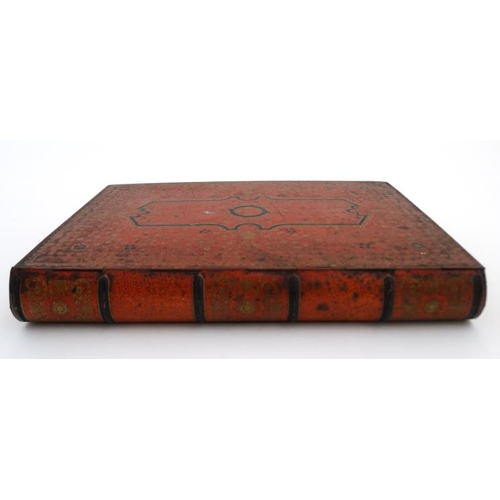 877 - A c.1900 tin of book form  ( possibly a biscuit tin ) 9 7/8'' x 7'' x 1 3/8''