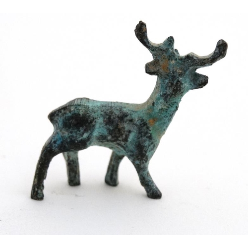 886 - Items to include a bronze antelope, small toggle, arrow head and small two handled pot . Understood ... 