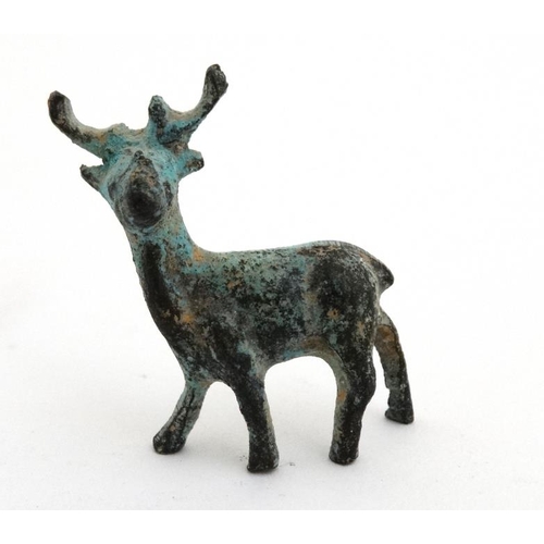 886 - Items to include a bronze antelope, small toggle, arrow head and small two handled pot . Understood ... 