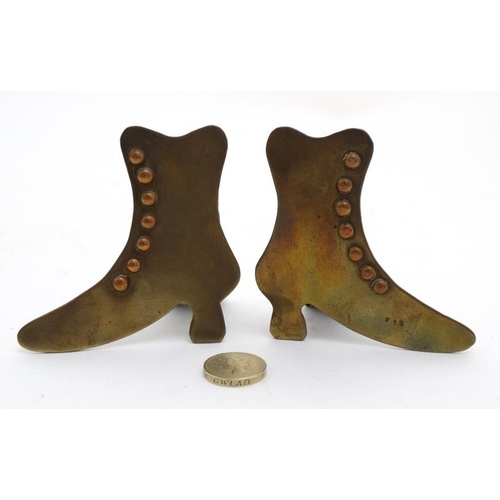 891 - A pair of Victorian chimney adornments in the form of of brass and copper ladies shoes. 3 7/8'' high... 