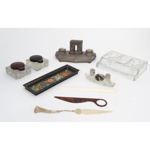 894 - A quantity of c.1900 desk items to include a glass standish, 2 glass inkwells with red and black lid... 