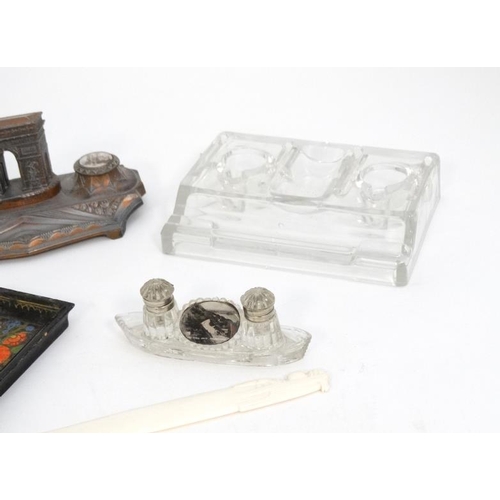 894 - A quantity of c.1900 desk items to include a glass standish, 2 glass inkwells with red and black lid... 