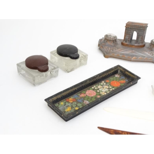 894 - A quantity of c.1900 desk items to include a glass standish, 2 glass inkwells with red and black lid... 