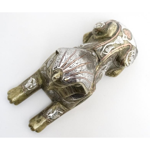 896 - A Victorian desk top inkwell in the form of a sphinx profusely inlaid with copper and silver to the ... 