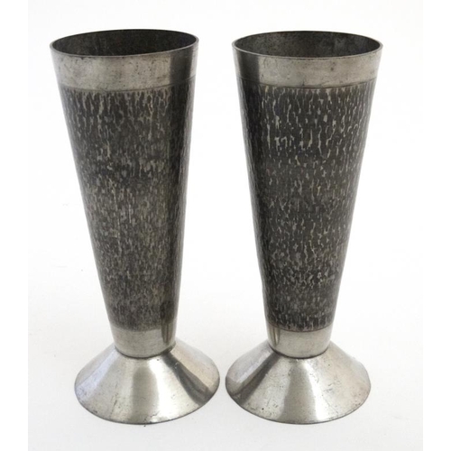 897 - A pair of stainless steel Stuart Devlin style candlesticks. 6 1/4'' high