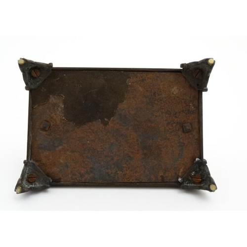 899 - A French 19thC patinated bronze inkstand / standish , the squared cover having a figurative tableau ... 