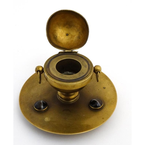 901 - A Victorian brass inkstand decorated with banded agate cabochon and hinged orb style inkwell within.... 