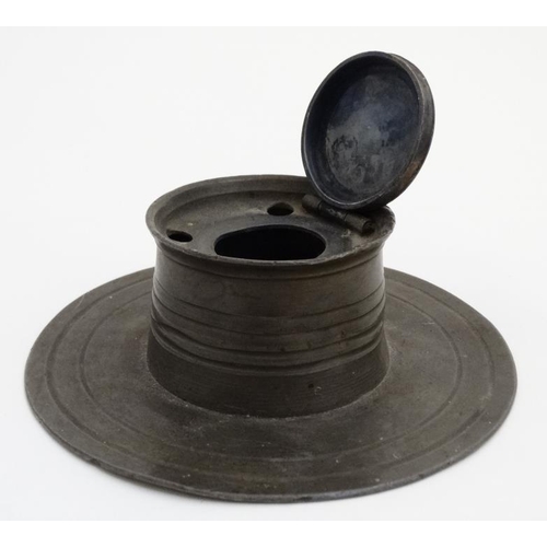 905 - A 19thC pewter capstan inkwell with 5 dipping pen / quill rests within. 6'' diameter