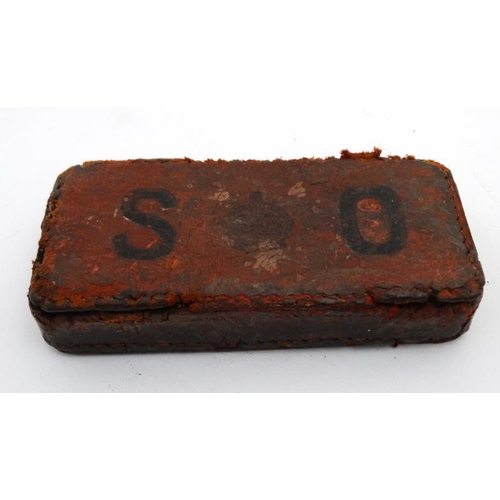 907 - A lead weighted red leather paperweight / doorstop marked SO ( stationary Office) with impressed cro... 