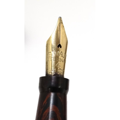 910 - Fountain Ink Pen : A mid 20thC ' Swan Self Filler Eternal ' pen by Mabie Todd & Co , having a no.4 1... 