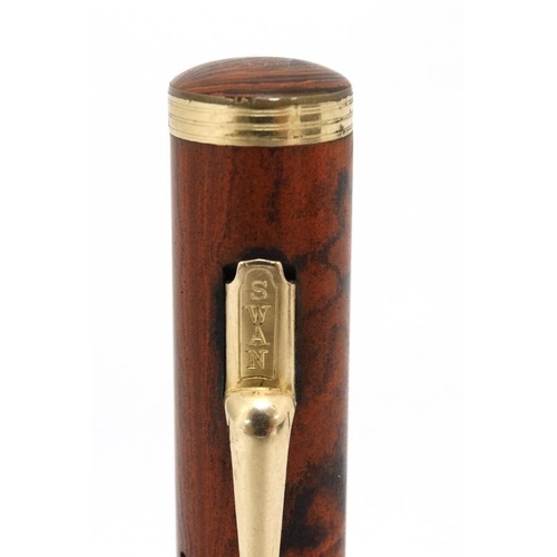 910 - Fountain Ink Pen : A mid 20thC ' Swan Self Filler Eternal ' pen by Mabie Todd & Co , having a no.4 1... 