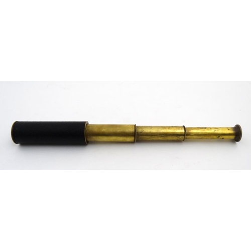 911 - A c.1900 'British' brass personal 3-draw telescope extending to 14 1/4''