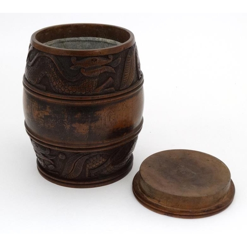 917 - Treen : Anglo Chinese carved walnut tobacco barrel with lead liner and decorated with monogram and d... 