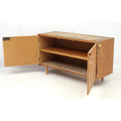 92 - Vintage Retro :   A British university 2 door cabinet on turned shaped legs, opening to reveal two l... 