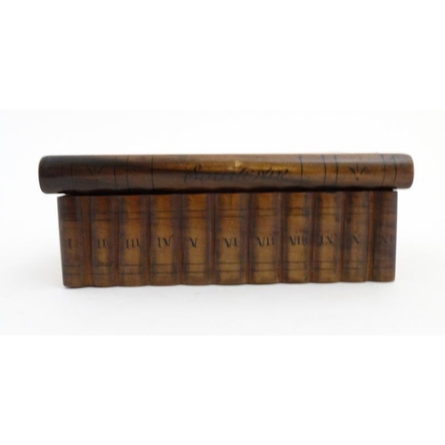 923 - A Continental olive wood puzzle sewing box in the form of stacked books with sections within. 8'' wi... 