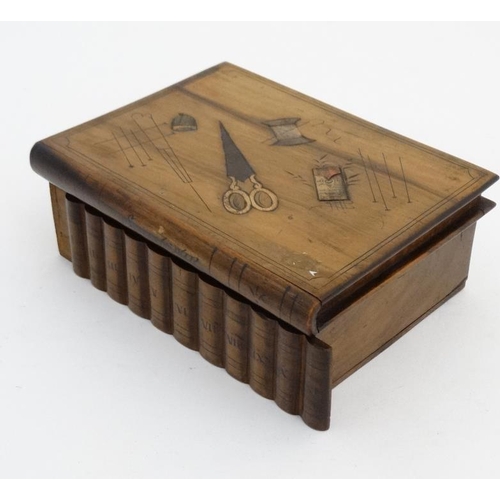 923 - A Continental olive wood puzzle sewing box in the form of stacked books with sections within. 8'' wi... 