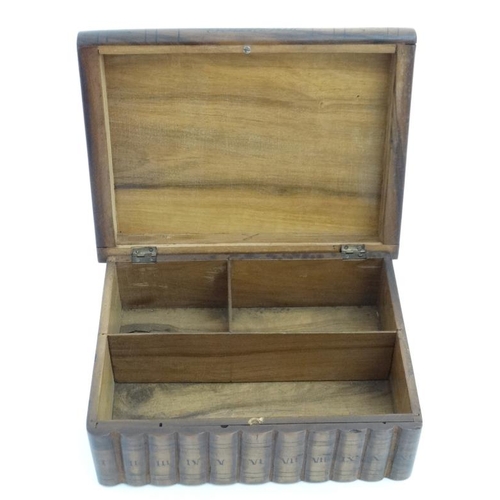 923 - A Continental olive wood puzzle sewing box in the form of stacked books with sections within. 8'' wi... 