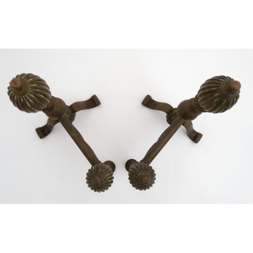 956 - A pair of 19thC andirons with gadrooned oval decoration 12'' high