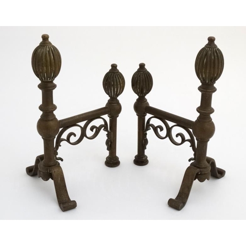 956 - A pair of 19thC andirons with gadrooned oval decoration 12'' high