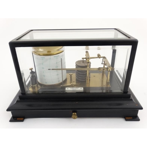 957 - Barograph : An ebonised and bevelled glass barograph bears label for 'Yeats & Son Ltd Dublin' 14 1/2... 