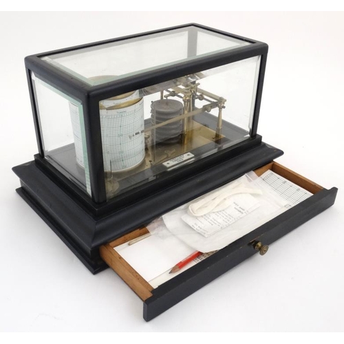 957 - Barograph : An ebonised and bevelled glass barograph bears label for 'Yeats & Son Ltd Dublin' 14 1/2... 