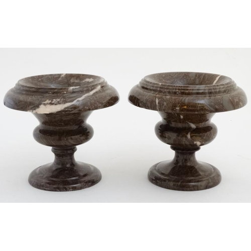 964 - A pair of marble pedestal urns standing 7 1/2'' high x 8 3/4'' wide