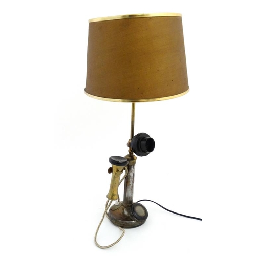 965 - An old electric lamp formed form a candlestick telephone with shade. Approx 25 1/2'' high