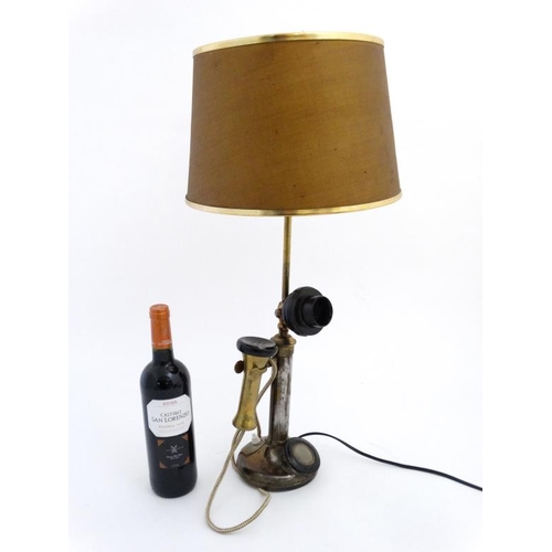 965 - An old electric lamp formed form a candlestick telephone with shade. Approx 25 1/2'' high