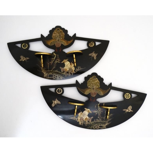 979 - Foochow China Lacquer wares: A pair of demi lune wall hanging folding shelves with figure on a donke... 