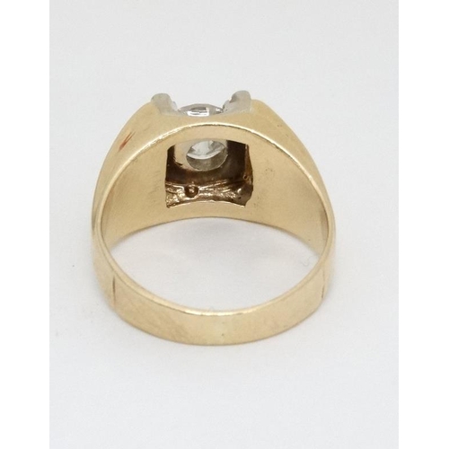 997 - A 14k gold ring set with central diamond solitaire