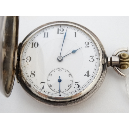 1138 - Silver cased Full Hunter Pocket Watch : a Top Wind ' 925' cased swiss made 15 jewel Pocketwatch with... 