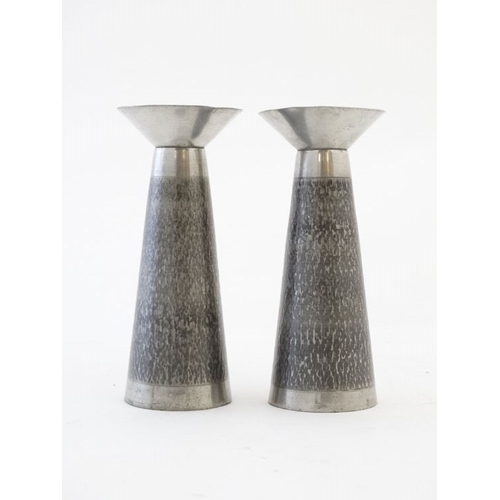 897 - A pair of stainless steel Stuart Devlin style candlesticks. 6 1/4'' high