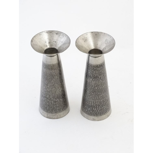 897 - A pair of stainless steel Stuart Devlin style candlesticks. 6 1/4'' high