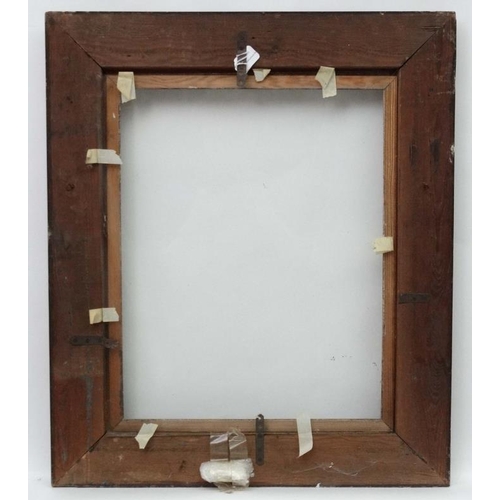 48 - Picture Frame : An ornate late 19thC picture frame having a gilt slip and glass, decorated in brown ... 