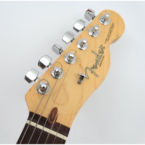 390 - Musical Instruments : a Fender ' American Standard ' Telecaster , having a solid ash body , maple ne... 