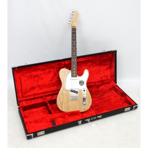 390 - Musical Instruments : a Fender ' American Standard ' Telecaster , having a solid ash body , maple ne... 