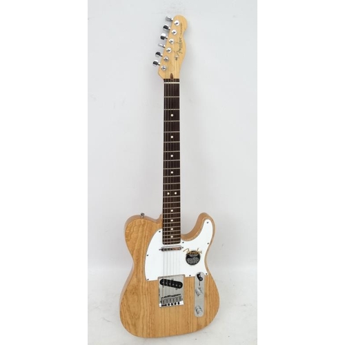 390 - Musical Instruments : a Fender ' American Standard ' Telecaster , having a solid ash body , maple ne... 