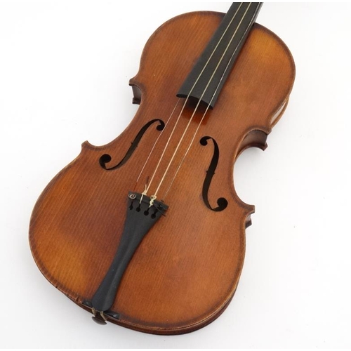 392 - Musical Instruments : An early 20thC 3/4 size student's Violin . Bears label within ' Phebe ' ( thou... 