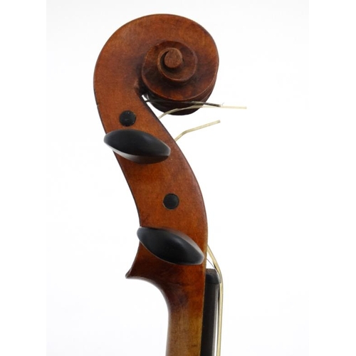 392 - Musical Instruments : An early 20thC 3/4 size student's Violin . Bears label within ' Phebe ' ( thou... 