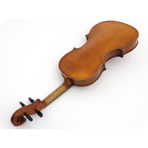 392 - Musical Instruments : An early 20thC 3/4 size student's Violin . Bears label within ' Phebe ' ( thou... 